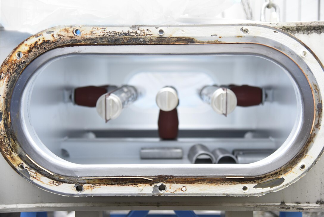 A busbar causing gas to leak sits in the West Substation at Yokota Air Base, Japan, April 8, 2017. During the power outage, the 374th Civil Engineer Squadron and contractors de-energized the transformers, removed the remaining gas from the busbar on the gas-insulated high-voltage switchgear, deconstructed the busbar, repaired a rusty flange and replaced a gasket of the busbar. (U.S. Air Force photo by Machiko Arita)