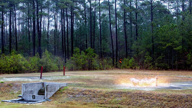 Marines take cover after throwing an M67 fragmentation grenade during a grenade range at Marine Corps Base Camp Lejeune, N.C., March 31, 2017. The training prepares Marines for world-wide deployment by building their confidence with the weapon system. The Marines are with 2nd Reconnaissance Battalion. 