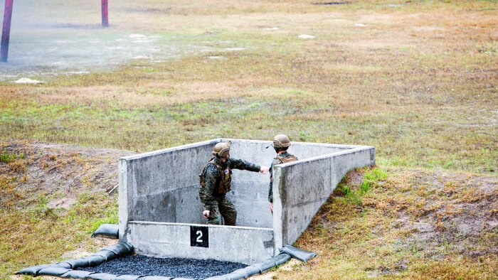 A Marine throws an M67 fragmentation grenade during a grenade range at Marine Corps Base Camp Lejeune, N.C., March 31, 2017. The training helped Marines build trust and confidence in each other by refining the skills needed to operate in a combat environment. The Marines are with 2nd Reconnaissance Battalion. 