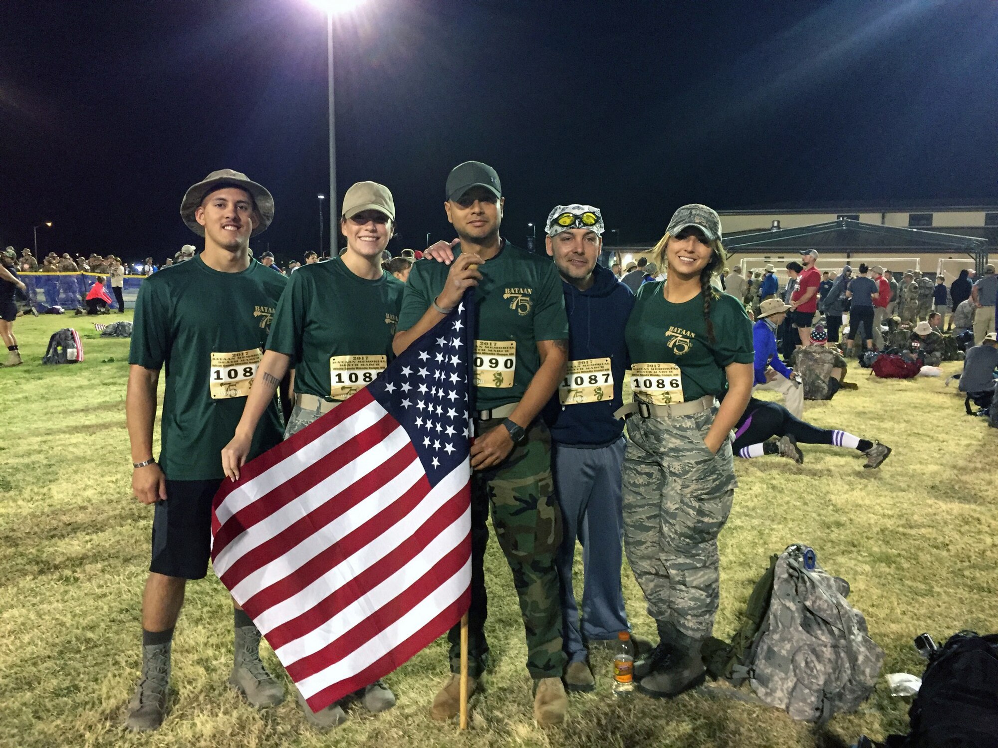 Senior Airman Jonathon Lych-Cay, Staff Sgt. Lynley Mainous, Master Sgt. Jonathon Nossa, Master Sgt. Chad Kelly and Tech. Sgt. Kaitlyn Barone complete the 26.2 mile ruck march as part of the Bataan Death March, White Sands NM, March 19.
Participants were required to wear 35 pound back packs during the event.