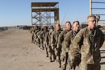 U.S. Servicemembers line up to complete the confidence climb obstacle (right), during day zero of U.S. Army Central’s first Air Assault Course, April 4, 2017, at Camp Beuhring, Kuwait. The Air Assault Course is a 12-day class that allows U.S. military personnel in the USARCENT theater of operations the unique opportunity to become air assault qualified, while deployed outside the continental United States.  “Once completed, the perspective student goes on to become the subject matter expert to their company or unit commander assisting them with planning for air assault operations into whatever environment they may need,” said Capt. Ronald Snyder, Company B commander, Army National Guard Warrior Training Center.