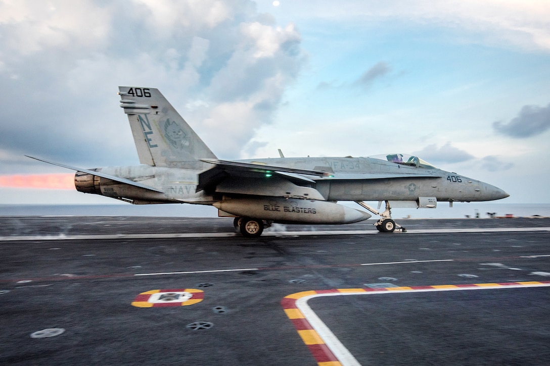 A Navy F/A-18C Hornet launches from the flight deck aboard the aircraft carrier USS Carl Vinson in the South China Sea, April 8, 2017. The pilot is assigned to Strike Fighter Squadron 34. Navy photo by Petty Officer 3rd Class Matt Brown 