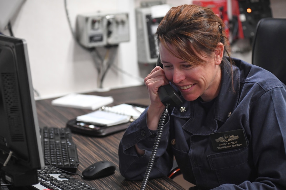 MEDITERRANEAN SEA (April 9, 2017) Cmdr. Andria L. Slough, commanding officer of the guided-missile destroyer USS Porter (DDG 78), receives a telephone call from President Donald J. Trump, April 9, 2017. Porter, forward-deployed to Rota, Spain, is conducting naval operations in the U.S. 6th Fleet area of operations in support of U.S. national security interests in Europe. (U.S. Navy photo by Mass Communication Specialist 3rd Class Ford Williams/Released)