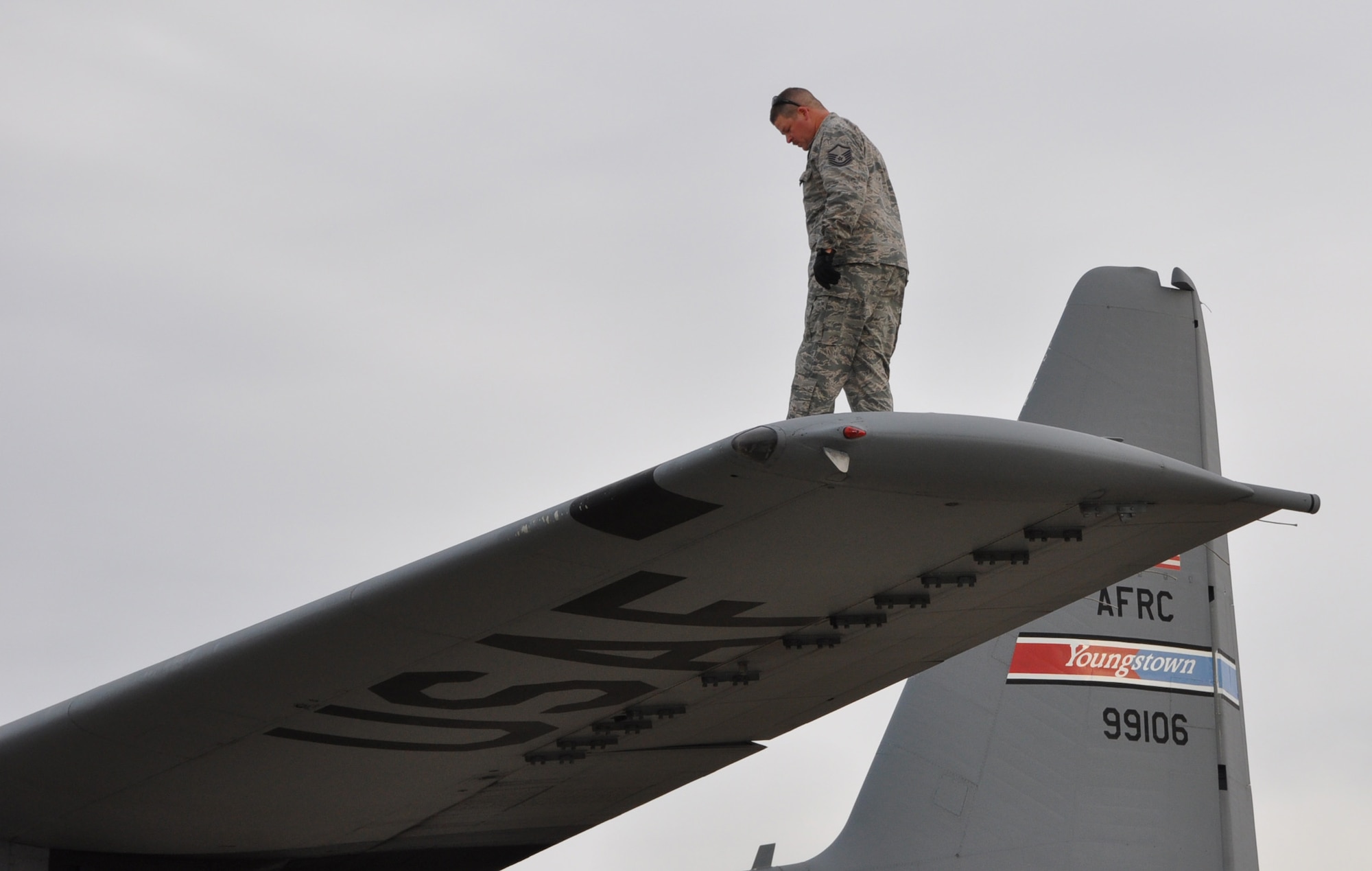 Master Sgt. Dan Scott, 910th Aircraft Maintenance Squadron Dedicated Crew Chief (DDC), performs the upper wing portion of a preflight inspection on a C-130H Hercules aircraft here, April 3, 2017. Preflight inspections help ensure safety for the aircrew and aircraft. Scott is the DDC on this aircraft. (U.S. Air Force photo/Maj. Polly Orcutt)