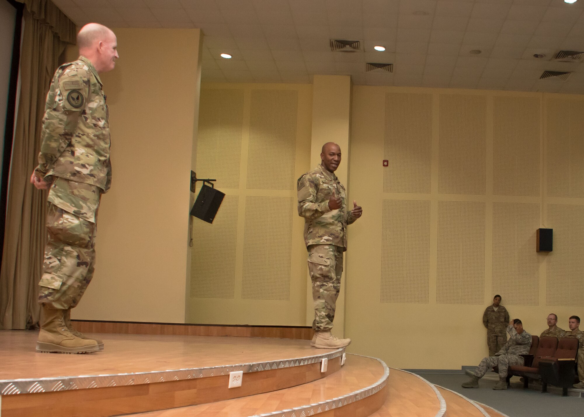 Vice Chief of Staff of the Air Force, Gen. Stephen W. Wilson, left, and Chief Master Sergeant of the Air Force Kaleth O. Wright address an audience of Airmen during an all call at an undisclosed location in Southwest Asia April 9, 2017. They held an all call during their visit and discussed priorities for improving Airmen’s lives. (U.S. Air Force photo/Staff Sgt. Andrew Park)