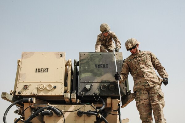 Soldiers of Battery D, 4th BN, 5th Air Defense Artillery Regiment, demonstrate reloading a Patriot missile battery for Soldiers of Task Force Spartan at a Patriot Missile site on Camp Buerhing, Kuwait April 8, 2017. Task Force Spartan personnel visited the site to obtain an on-the-ground assessment of the operational needs of Patriot Missile sites within the Task Force Spartan area of responsibility. (U.S. Army Photo by Master Sergeant Sean McCollum, 29th Infantry Division Public Affairs)