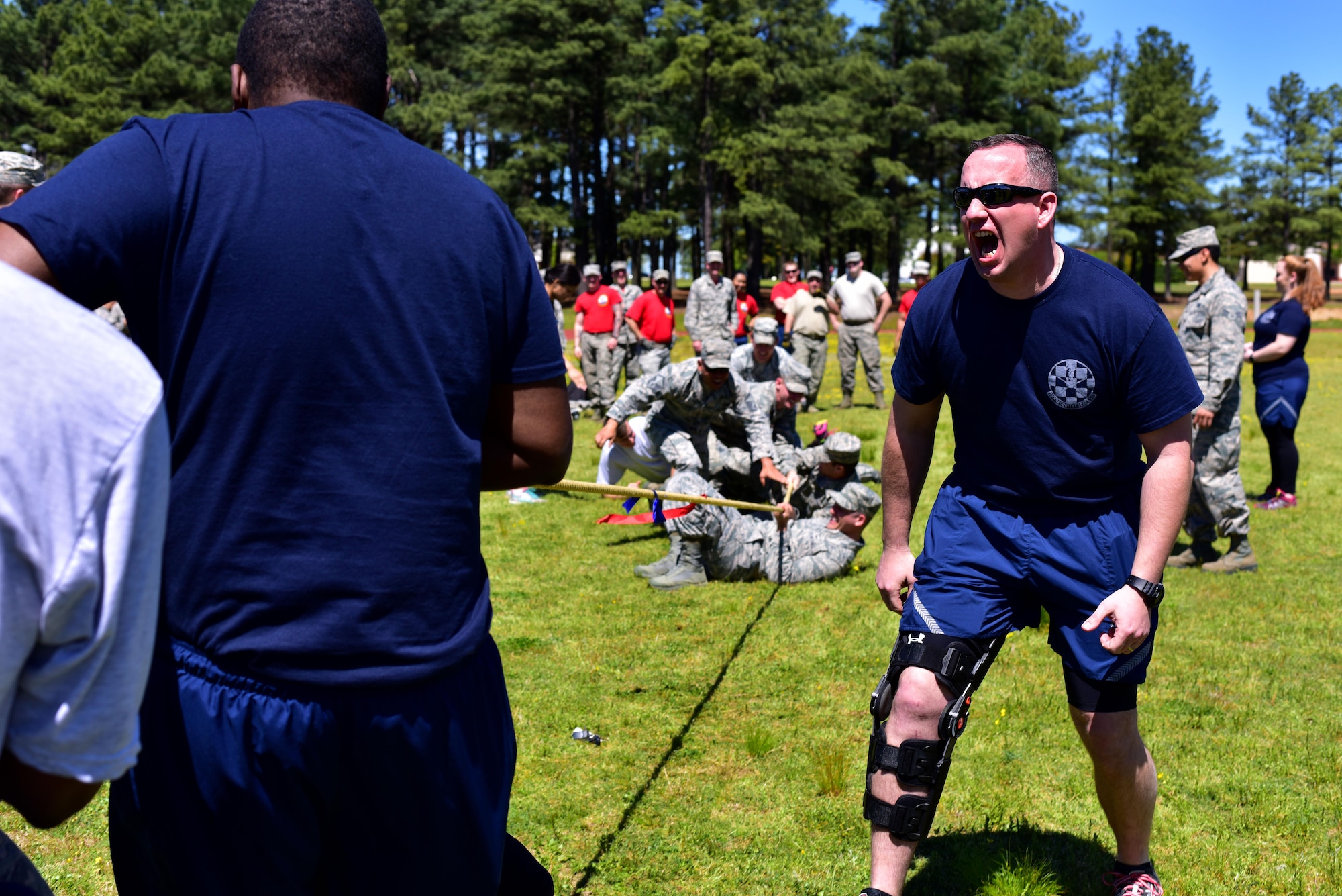 U.S. Air Force Master Sgt. Paul Evans, 19th Security Forces Logistics superintendent, motivates his Defenders in a tug of war contest April 7, 2017 during the Mission Support Group Warrior Ethos Challenge at the track on Little Rock Air Force Base, Ark. The Warrior Ethos Challenge runs through multiple events of strength, endurance, resilence and teamwork and has been an annual MSG event for five years.   
(U.S. Air Force photo by Staff Sgt. Jeremy McGuffin)