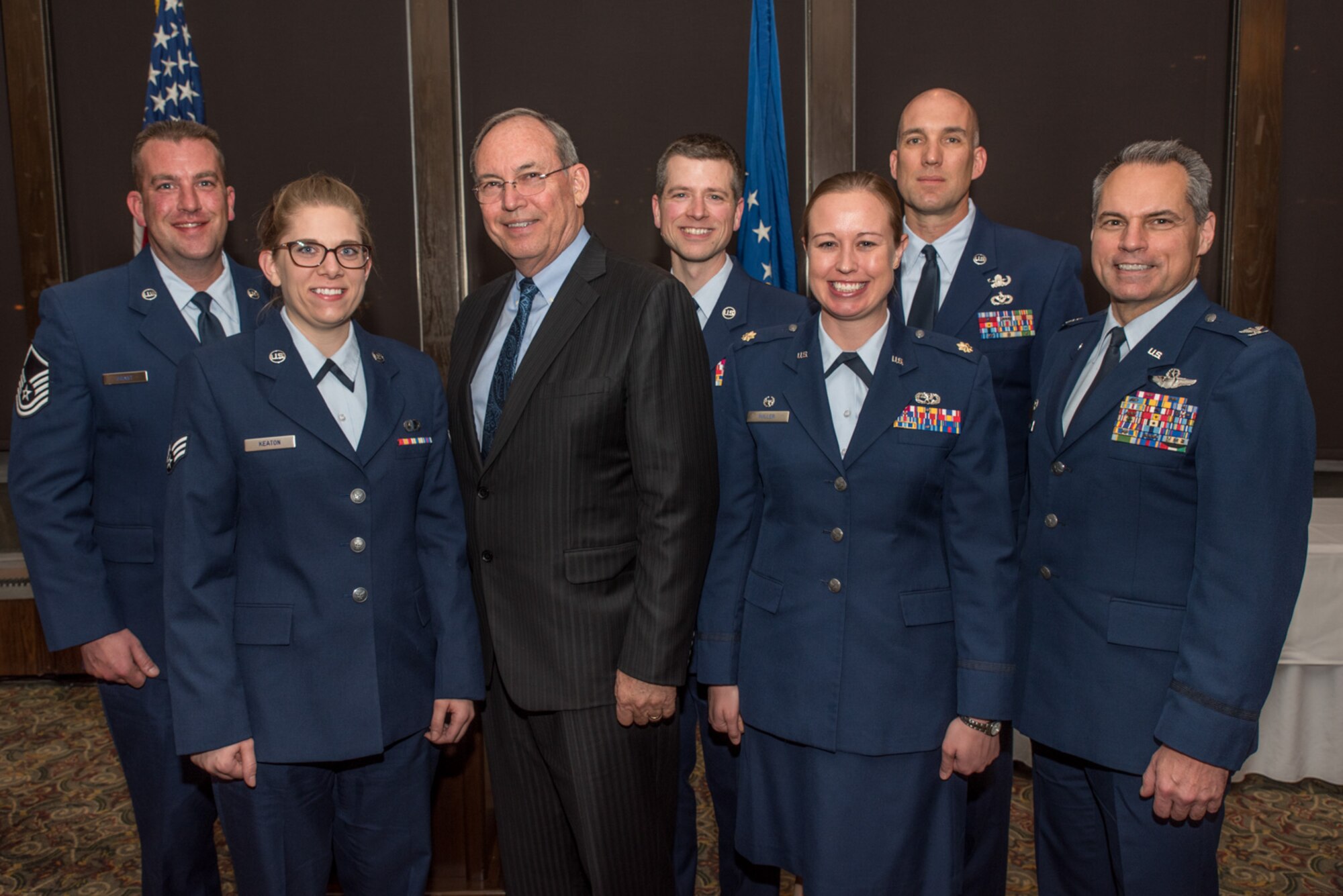 Col. Anthony Polashek, commander of the 934th Airlift Wing at the Minneapolis-St. Paul international Airport Air Reserve Station, Mn., joins retired Air Force Lt. Gen. David Deptula, dean of the Mitchell Institute for Aerospace Power Studies, in congratulating this years winners at the Air Force Association’s 2017 Awards Dinner sponsored by the General E. W. Rawlings Chapter, April 7 at the Town & Country Club in St. Paul, Minn. (U.S. Air Force photo by Master Sgt. Eric Amidon)
