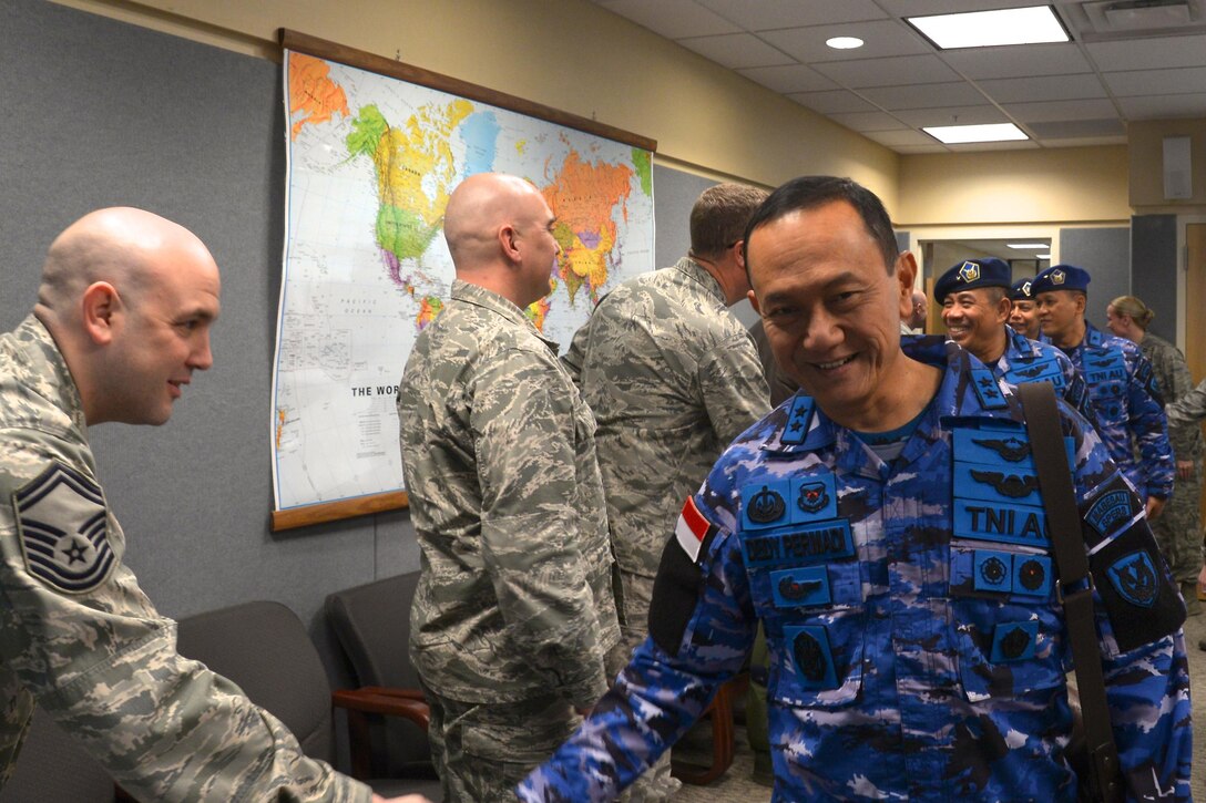 Generals of the Indonesian air force and New York Air National Guard 106th Rescue Wing members take a group picture outside the 103d Rescue Squadron, home of the Guardian Angles March 8, 2017, at Francis S. Gabreski Air National Guard Base.   

During the tour, the Indonesian air force generals got a firsthand look at the specialized gear, ranging from scuba gear, to cutting tools which the pararescuemen used to maintain their small equipment profile. (U.S. Air Force photo by Cheran A. Cambridge)