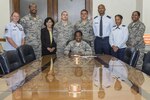Lt. Col. Tamona Bright, 502nd Security Readiness Group staff judge advocate, signs her Air Force Assistance Fund pledge with Joint Base San Antonio AFAF installation project officers, unit project officers and key workers April 10, 2017, at Joint Base San Antonio-Randolph. The AFAF campaign, made up of Air Force Villages Inc., Air Force Aid Society Inc., Air Force Enlisted Village Inc. and the General and Mrs. Curtis E. LeMay Foundation, help eligible recipients with emergencies, educational support or securing retirement homes for widows or widowers of Air Force members in need of financial assistance. (U.S. Air Force photo by Senior Airman Stormy Archer)