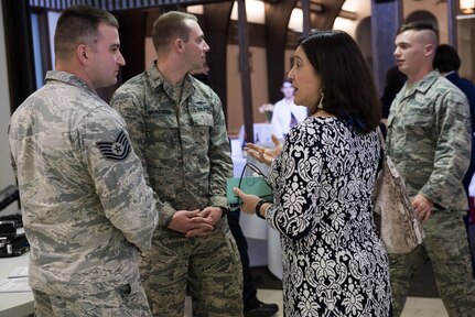 Members of the 5th Combat Communications Squadron speak to local community leaders during the 24th Air Force Community Open House April 6 on Port San Antonio, Texas. The 5th CCG is responsible for providing rapid deployment of communications and cyber capabilities to contested environments.