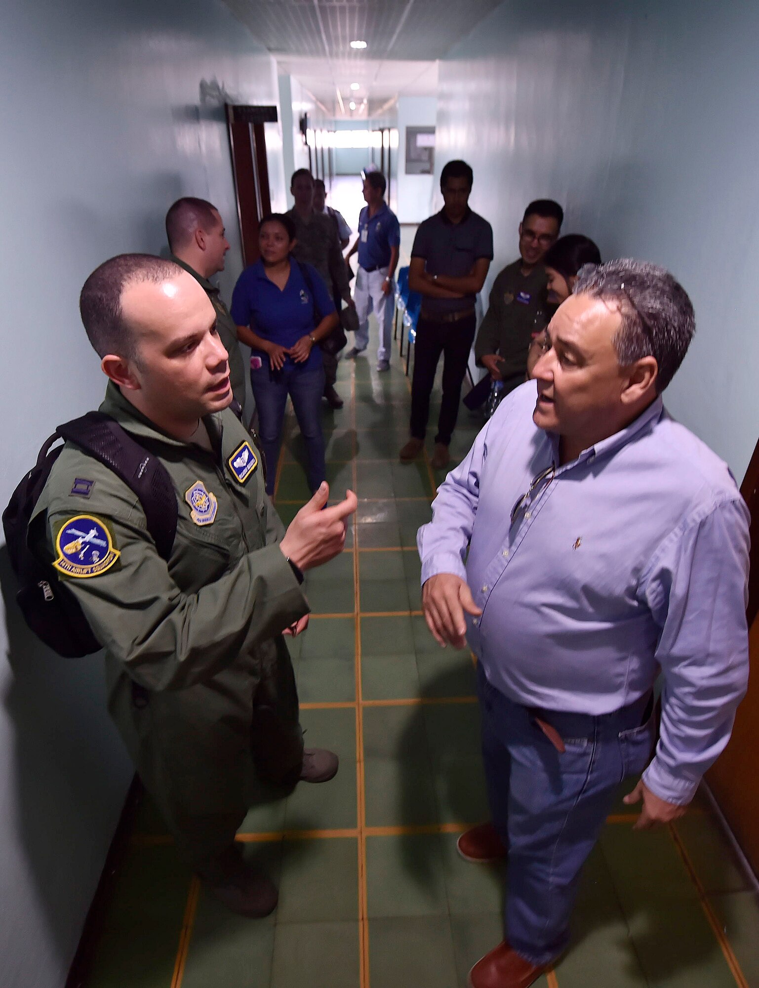 U.S. Air Force Capt. Ricardo Sequeira, 628th Medical Operations Support Squadron and 14th Airlift Squadron flight surgeon, Joint Base Charleston, South Carolina, talks about aerospace medicine best practices with Dr. Jose Alejandro Servellon Duran, Fuerza Aerea de Honduras Comandancia General aerospace medicine, as part of a subject matter expert exchange in Tegucigalpa, Honduras, April 4. The global health engagement brought U.S. and Honduran counterparts together to build and strengthen partner relationships.