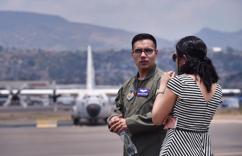 U.S. Air Force Tech. Sgt. Johann Bermudez, U.S. Air Force School of Aerospace Medicine aeromedical evacuation instructor, Wright-Patterson Air Force Base, Ohio, talks about aerospace medicine best practices with Marcela Servellon, Honduran government, Colonial Monterrey doctor of medicine, as part of a subject matter expert exchange with members of the Honduran Air Force in Tegucigalpa, Honduras, April 4. The global health engagement brought U.S. and Honduran counterparts together to build and strengthen partner relationships.