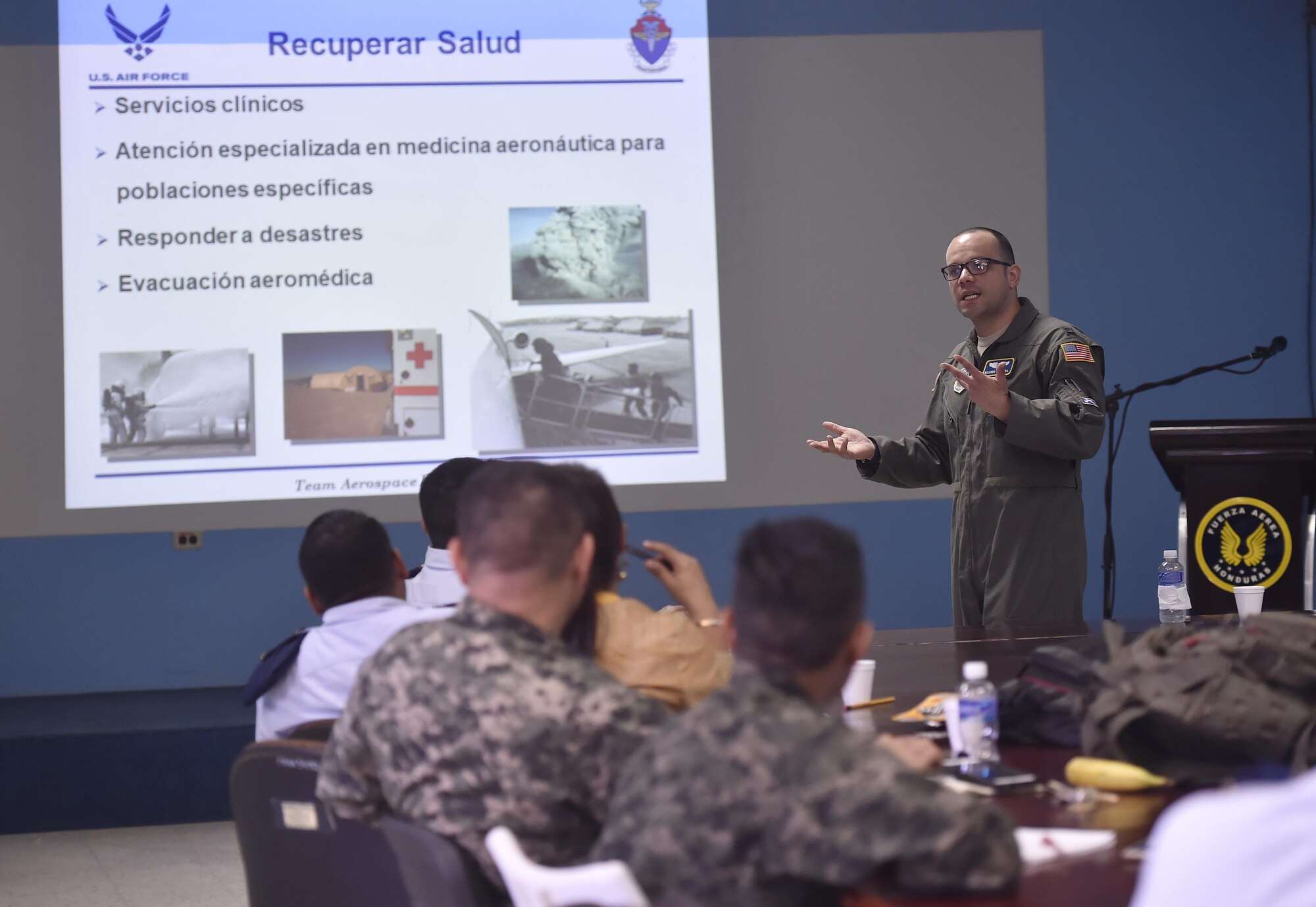 U.S. Air Force Capt. Ricardo Sequeira, 628th Medical Operations Support Squadron and 14th Airlift Squadron flight surgeon, Joint Base Charleston, South Carolina, talks about aerospace medicine with Honduran air force members as part of a subject matter expert exchange in Tegucigalpa, Honduras, April 4. The global health engagement brought U.S. and Honduran counterparts together to build and strengthen partner relationships.