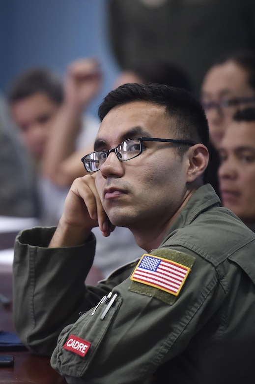 U.S. Air Force Tech. Sgt. Johann Bermudez, U.S. Air Force School of Aerospace Medicine aeromedical evacuation instructor, Wright-Patterson Air Force Base, Ohio, participates in a discussion focused on aerospace medicine best practices as part of a subject matter expert exchange involving U.S. Air Force and Honduran air force members in Tegucigalpa, Honduras, April 4. The global health engagement brought U.S. and Honduran counterparts together to build and strengthen partner relationships.