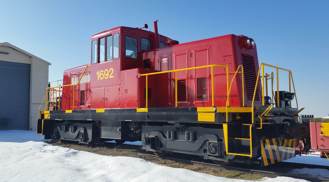 A retired Army locomotive sits atop a flat car for its move to Lake Providence, Louisiana and it's second career. 