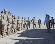 Mr. Brian Long, project officer for the Joint Non-Lethal Weapons Directorate briefs Marines on the Active Denial System during Weapons and Tactics Instructor course (WTI) 2-17 at Site 50, Wellton, Ariz., April 4, 2017. The Aviation Development, Tactics and Evaluation Department and Marine Operational Test and Evaluation Squadron One (VMX-1) Science and Technology Departments conducted the tactical demonstration to explore and expand existing capabilities. MAWTS-1 provides standardized advanced tactical training and certification of unit instructor qualifications to support Marine Aviation Training and Readiness and assist in developing and employing aviation weapons and tactics. (U.S. Marine Corps photo by Lance Cpl. Andrew M. Huff)