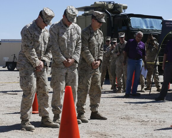 U.S. Marines with 2nd Low Altitude Air Defense Battalion, Marine Air Control Group 28, 2nd Marine Air Wing volunteer to participate in a tactical demonstration (TACDEMO) of the Active Denial System during Weapons and Tactics Instructor course (WTI) 2-17 at Site 50, Wellton, Ariz., April 4, 2017. The Aviation Development, Tactics and Evaluation Department and Marine Operational Test and Evaluation Squadron One (VMX-1) Science and Technology Departments conducted the TACDEMO to explore and expand existing capabilities. MAWTS-1 provides standardized advanced tactical training and certification of unit instructor qualifications to support Marine Aviation Training and Readiness and assist in developing and employing aviation weapons and tactics. (U.S. Marine Corps photo by Lance Cpl. Andrew M. Huff)