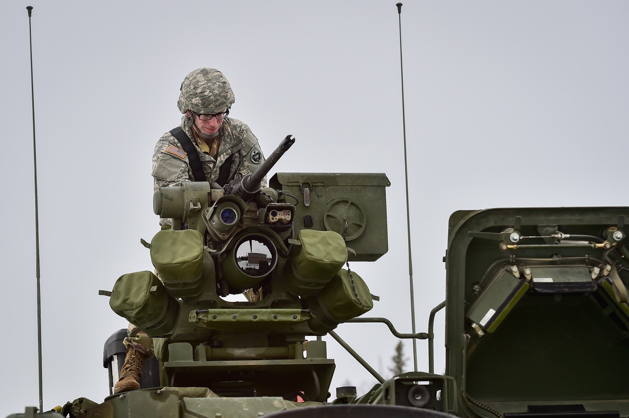 Spc. David Harper, a native of Johnstown, Ohio, assigned to the 95th Chemical Company, “Arctic Dragons”, 17th Combat Sustainment Support Battalion, U.S. Army Alaska, prepares to execute a gunnery live-fire exercise with M1135 Stryker Nuclear Biological Chemical Reconnaissance Vehicles on Joint Base Elmendorf-Richardson, Alaska, April 5, 2017.  The gunnery tested Soldier’s proficiency with identifying, engaging, and eliminating hostile targets while increasing combat effectiveness. The Styker NBCRV provides Nuclear, Biological, and Chemical detection and surveillance for battlefield visualization, and situational awareness to increase unit combat power.  The core of the NBCRV is its on-board integrated NBC sensor suite, and integrated meteorological system.  An NBC positive overpressure system minimizes cross-contamination of samples and detection instruments, provides crew protection, and allows extended operation at Mission Oriented Protective Posture.