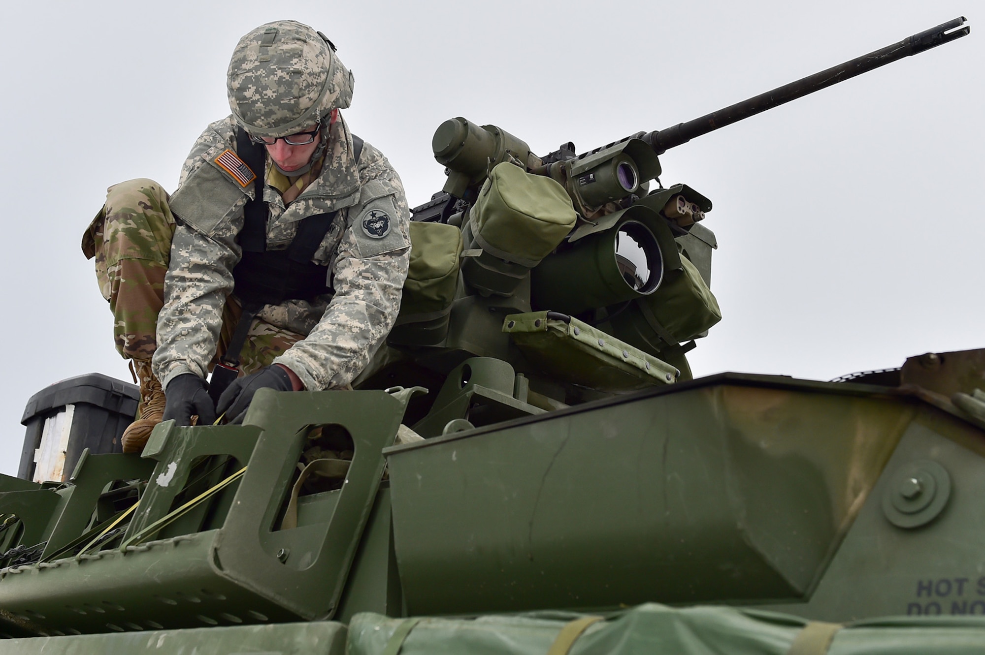 Spc. David Harper, a native of Johnstown, Ohio, assigned to the 95th Chemical Company, “Arctic Dragons”, 17th Combat Sustainment Support Battalion, U.S. Army Alaska, prepares to execute a gunnery live-fire exercise with M1135 Stryker Nuclear Biological Chemical Reconnaissance Vehicles on Joint Base Elmendorf-Richardson, Alaska, April 5, 2017.  The gunnery tested Soldier’s proficiency with identifying, engaging, and eliminating hostile targets while increasing combat effectiveness. The Styker NBCRV provides Nuclear, Biological, and Chemical detection and surveillance for battlefield visualization, and situational awareness to increase unit combat power.  The core of the NBCRV is its on-board integrated NBC sensor suite, and integrated meteorological system.  An NBC positive overpressure system minimizes cross-contamination of samples and detection instruments, provides crew protection, and allows extended operation at Mission Oriented Protective Posture. 