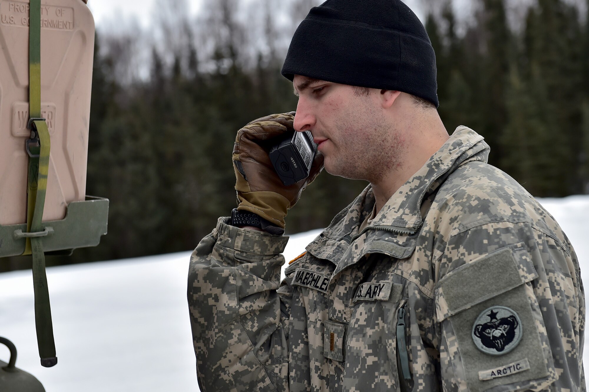 Army 2nd Lt. Jacob Maechler, a native of Mena, Ark., assigned to the 95th Chemical Company, “Arctic Dragons”, 17th Combat Sustainment Support Battalion, U.S. Army Alaska, makes a radio check before a gunnery live-fire exercise with M1135 Stryker Nuclear Biological Chemical Reconnaissance Vehicles on Joint Base Elmendorf-Richardson, Alaska, April 5, 2017.  The gunnery tested Soldier’s proficiency with identifying, engaging, and eliminating hostile targets while increasing combat effectiveness. The Styker NBCRV provides Nuclear, Biological, and Chemical detection and surveillance for battlefield visualization, and situational awareness to increase unit combat power.  The core of the NBCRV is its on-board integrated NBC sensor suite, and integrated meteorological system.  An NBC positive overpressure system minimizes cross-contamination of samples and detection instruments, provides crew protection, and allows extended operation at Mission Oriented Protective Posture.