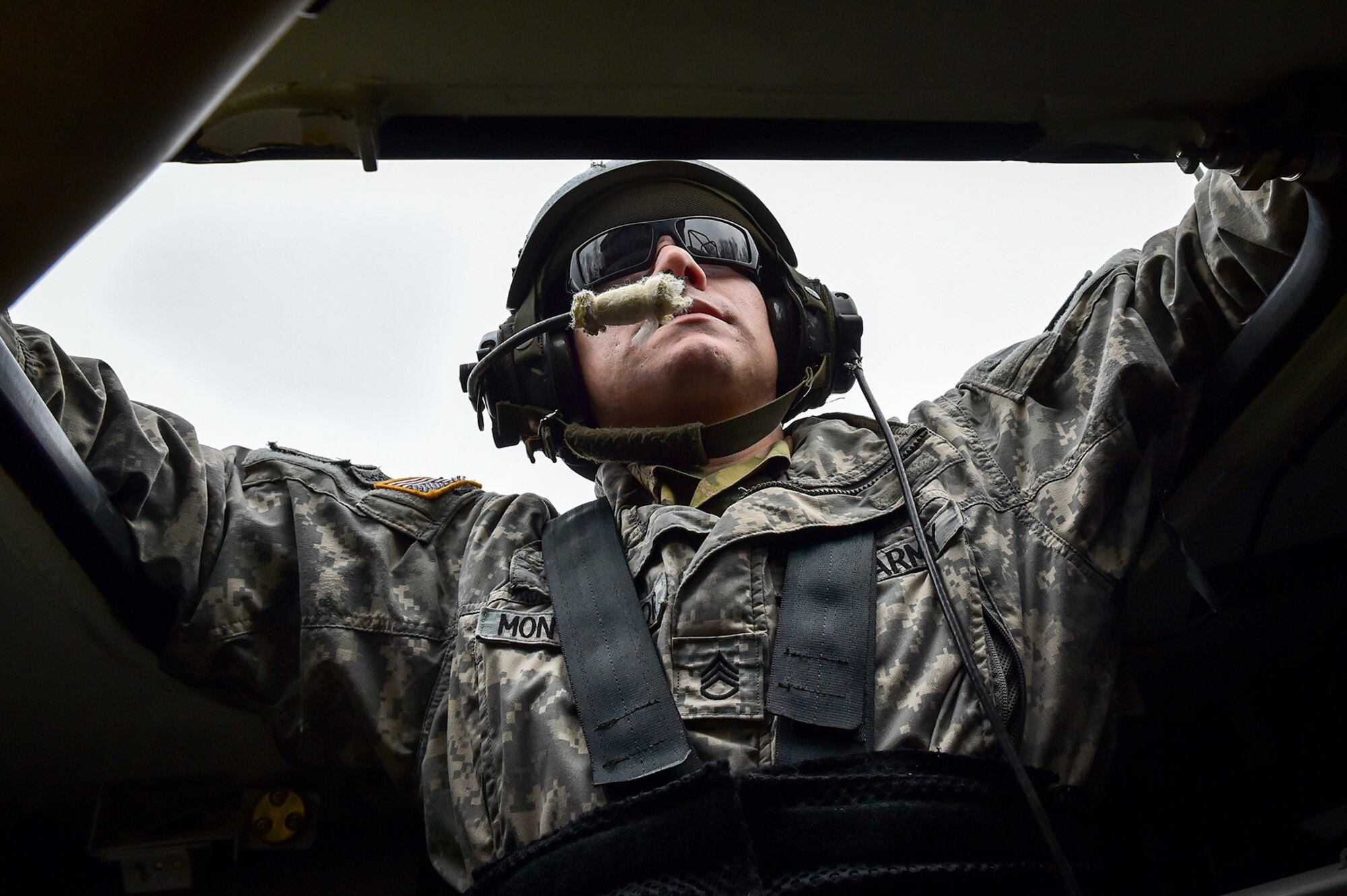 Army Staff Sgt. Jonathan Montemayor, a native of San Antonio, Texas, assigned to the 95th Chemical Company, “Arctic Dragons”, 17th Combat Sustainment Support Battalion, U.S. Army Alaska, watches fellow Soldiers load ammunition at a supply point before a gunnery live-fire exercise with M1135 Stryker Nuclear Biological Chemical Reconnaissance Vehicles on Joint Base Elmendorf-Richardson, Alaska, April 5, 2017.  The gunnery tested Soldier’s proficiency with identifying, engaging, and eliminating hostile targets while increasing combat effectiveness. The Styker NBCRV provides Nuclear, Biological, and Chemical detection and surveillance for battlefield visualization, and situational awareness to increase unit combat power.  The core of the NBCRV is its on-board integrated NBC sensor suite, and integrated meteorological system.  An NBC positive overpressure system minimizes cross-contamination of samples and detection instruments, provides crew protection, and allows extended operation at Mission Oriented Protective Posture.