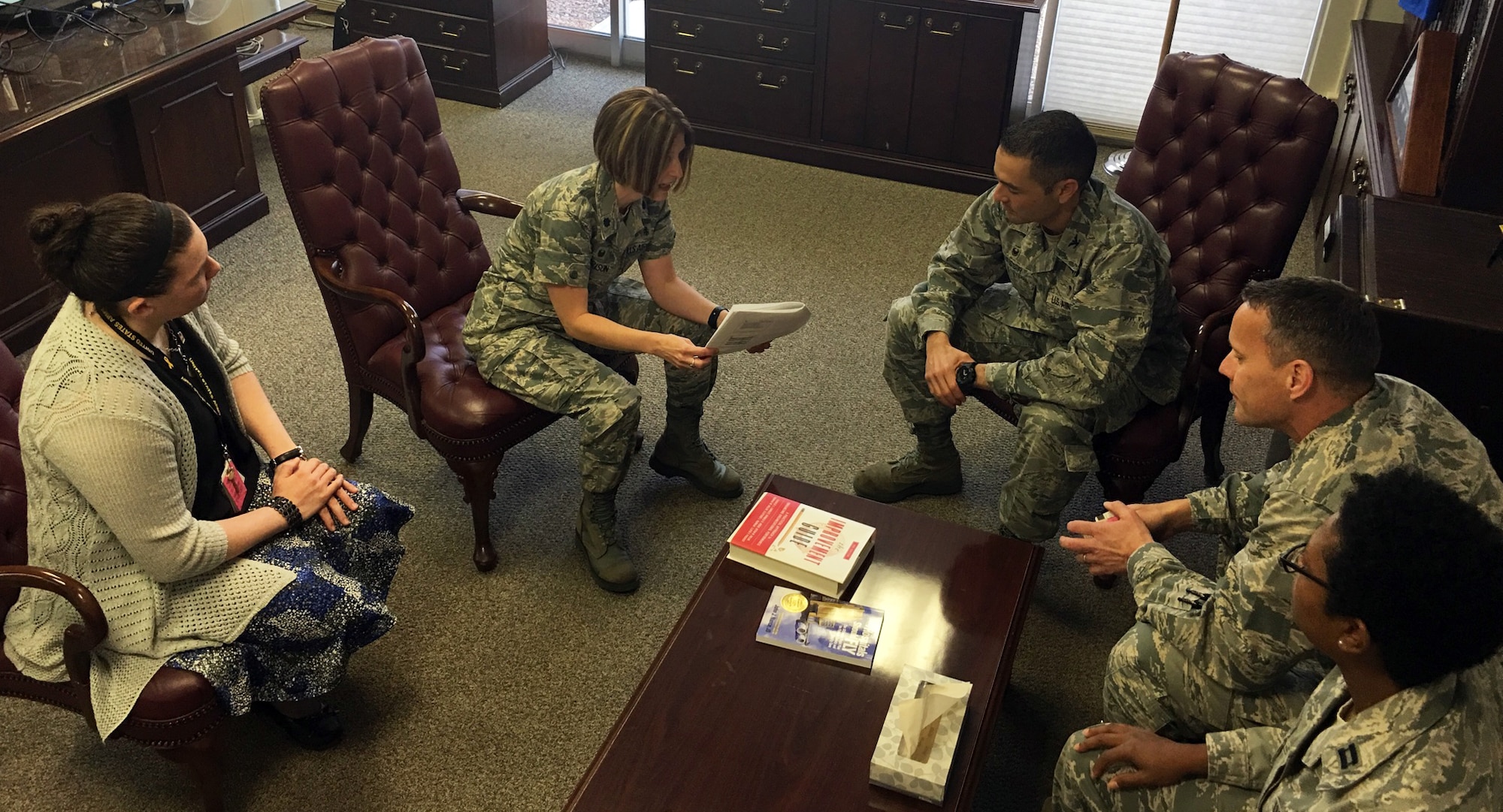 Photo of Lt. Col. Jennifer Garrison, 355th Medical Support Squadron briefs members of  Institute of Health Improvement collaboration team