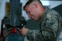 U.S. Air Force Airman 1st Class James Armeni, 20th Aircraft Maintenance 
Squadron weapons load crew member, tightens a sway brace at Shaw Air Force Base, S.C., April 3, 2017. The sway brace holds a GBU-12 Paveway II laser-guided bomb stable on an F-16CM Fighting Falcon during flight. (U.S. Air Force photo by Airman 1st Class Kathryn R.C. Reaves)