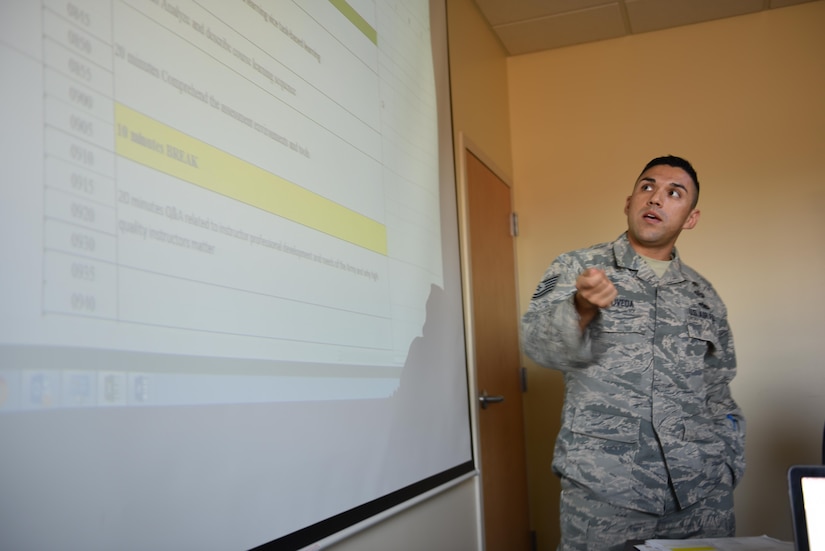 Technical Sergeant Amed Poveda, USAF, Joint Task Force-Bravo Legal Office Non-Commissioned Officer in Charge, explains the Program of Instruction to Honduran Senior Enlisted Advisors on Soto Cano Air Base, March 24, 2017. The United States Army Basic Instructor Course Program of Instruction was used as the model for this new program and has been adapted to fit the specific needs of the host nation. 