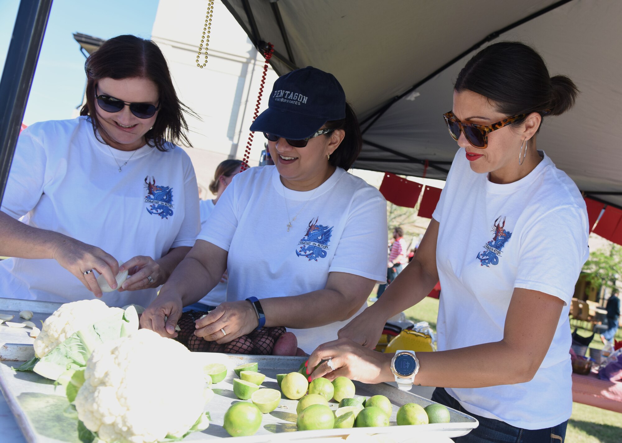 The “Crawfish In Action” team members prepare the ‘fixins’ for their crawfish during the 5th Annual Bay Breeze Crawfish Cook-Off at the Bay Breeze Event Center April 7, 2017, on Keesler Air Force Base, Miss. The “Keesler Chiefs” won first place overall and a free entry into the 25th Annual Mississippi Coast Coliseum Crawfish Festival Cook-Off. (U.S. Air Force photo by Kemberly Groue)