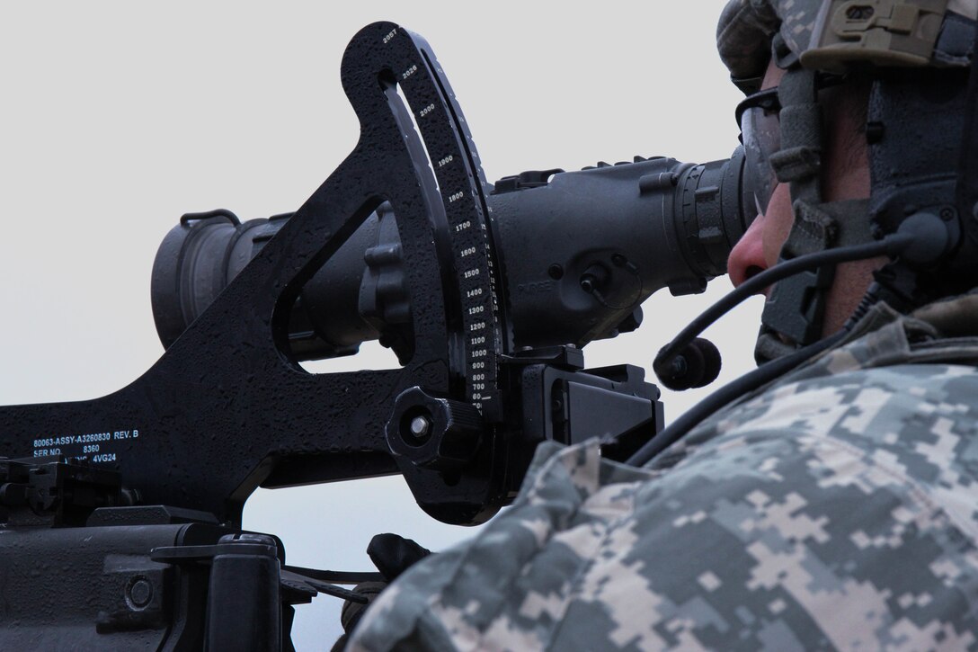 U.S. Army Reserve Sgt. 1st Class Mario Hernandez, 366th Engineer Company, 412th Theater Engineer Command views a target through a thermal weapon sight during Operation Cold Steel at Fort McCoy, Wis., April 10, 2017. Operation Cold Steel is the U.S. Army Reserve's crew-served weapons qualification and validation exercise to ensure that America's Army Reserve units and Soldiers are trained and ready to deploy on short-notice and bring combat-ready and lethal firepower in support of the Army and our joint partners anywhere in the world. (U.S. Army Reserve photo by Staff Sgt. Debralee Best, 84th Training Command)