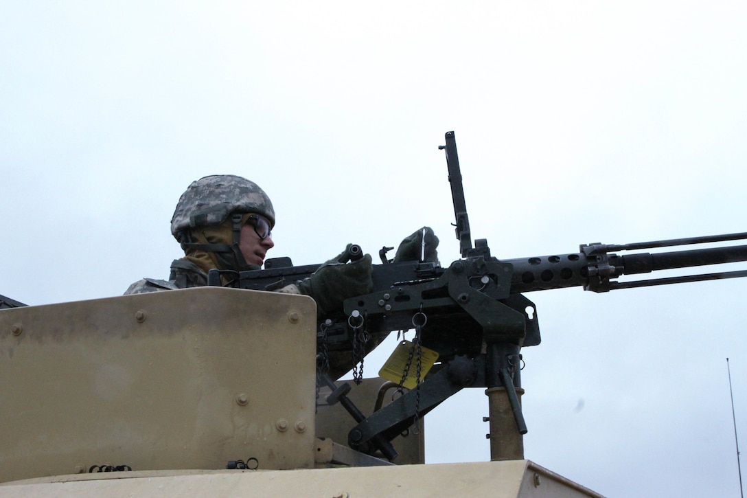 U.S. Army Reserve Spc. Ryan Boogren, 208th Transportation Company, 79th Sustainment Support Command checks head space and timing on an M2. .50 caliber machine gun prior to beginning the blank fire mounted gunnery range during Operation Cold Steel at Fort McCoy, Wis., April 10, 2017. Operation Cold Steel is the U.S. Army Reserve's crew-served weapons qualification and validation exercise to ensure that America's Army Reserve units and Soldiers are trained and ready to deploy on short-notice and bring combat-ready and lethal firepower in support of the Army and our joint partners anywhere in the world. (U.S. Army Reserve photo by Staff Sgt. Debralee Best, 84th Training Command)