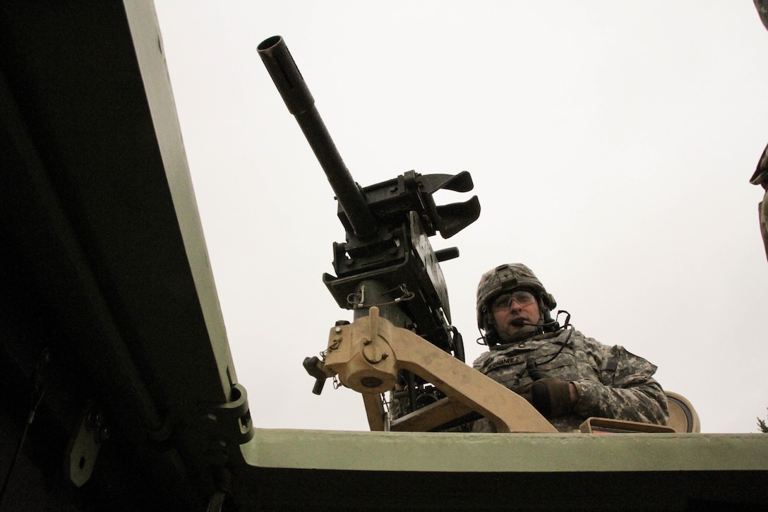 U.S. Army Reserve Sgt. 1st Class Mario Hernandez, 366th Engineer Company, 412th Theater Engineer Command communicates with the tower after completing blank fire during Operation Cold Steel at Fort McCoy, Wis., April 10, 2017. Operation Cold Steel is the U.S. Army Reserve's crew-served weapons qualification and validation exercise to ensure that America's Army Reserve units and Soldiers are trained and ready to deploy on short-notice and bring combat-ready and lethal firepower in support of the Army and our joint partners anywhere in the world. (U.S. Army Reserve photo by Staff Sgt. Debralee Best, 84th Training Command)