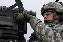 U.S. Army Reserve Sgt. 1st Class Mario Hernandez, 366th Engineer Company, 412th Theater Engineer Command adjusts the elevation of an MK19 automatic grenade launcher while completing blank fire during Operation Cold Steel at Fort McCoy, Wis., April 10, 2017. Operation Cold Steel is the U.S. Army Reserve's crew-served weapons qualification and validation exercise to ensure that America's Army Reserve units and Soldiers are trained and ready to deploy on short-notice and bring combat-ready and lethal firepower in support of the Army and our joint partners anywhere in the world. (U.S. Army Reserve photo by Staff Sgt. Debralee Best, 84th Training Command)