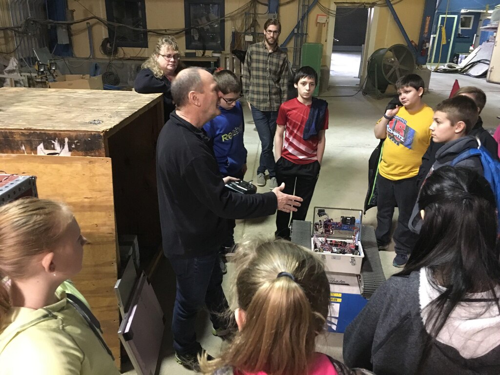 Blue Mountain Union School students recently visited the U.S. Army Engineer Research and Development Center’s Cold Regions Research and Engineering Laboratory as part of an education outreach program effort. Research Civil Engineer Leonard Zabilansky works throughout the year with the students in the classroom; the student’s CRREL visit helps solidify the classroom instruction. In the photo, CRREL Researcher Dr. Jim Lever talks with the students about the robots he has designed, built and deployed in both the Arctic and Antarctic.