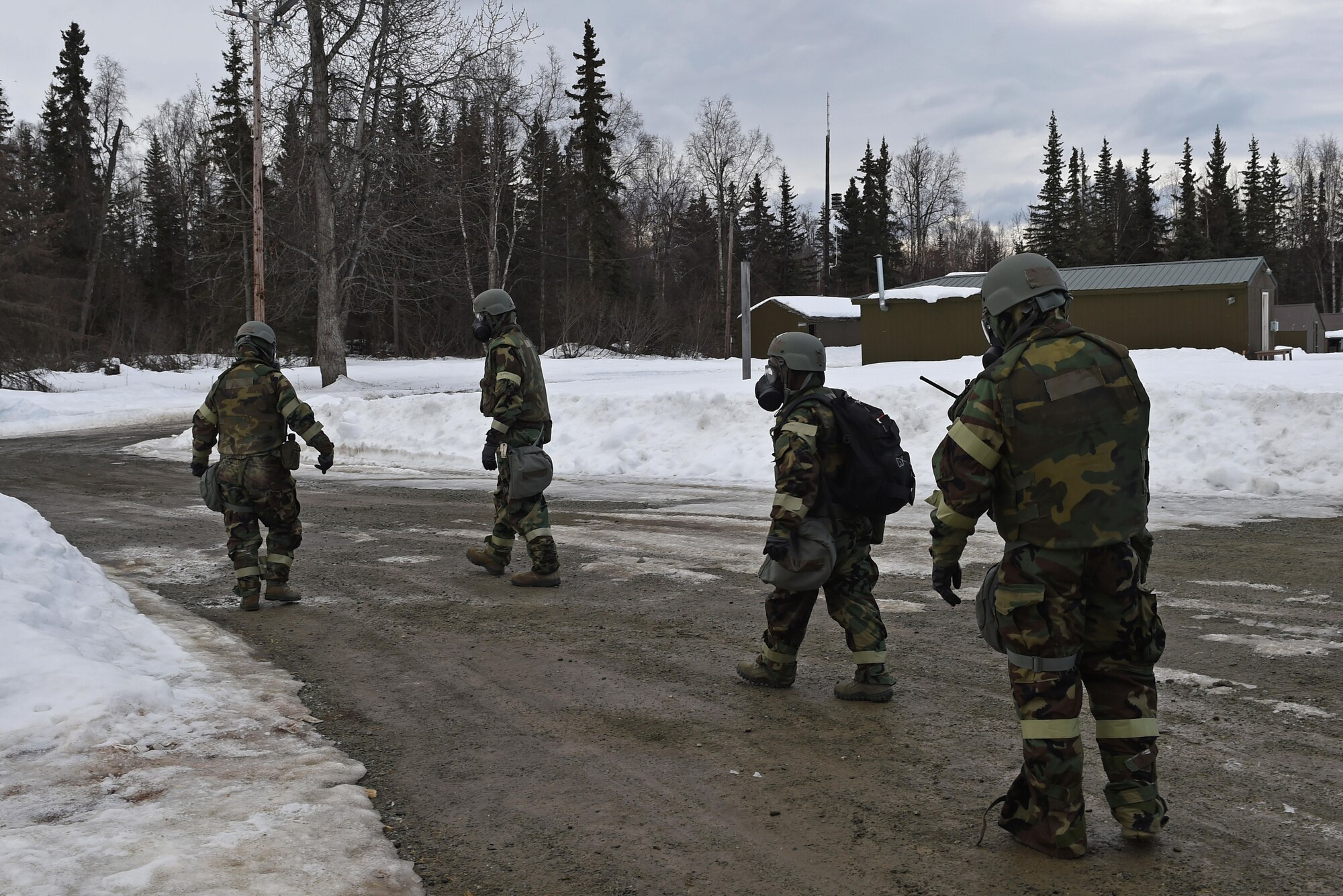 Airmen participate in Exercise Polar Force 17-4 at Joint Base Elmendorf-Richardson, Alaska, April 6, 2017. During the routine training exercise, Airmen donned Mission Oriented Protective Posture gear and engaged in various scenarios which tested their ability to handle real-world situations. 