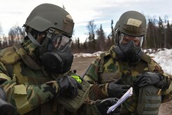 Airmen participate in Exercise Polar Force 17-4 at Joint Base Elmendorf-Richardson, Alaska, April 6, 2017. During the routine training exercise, Airmen donned Mission Oriented Protective Posture gear and engaged in various scenarios which tested their ability to handle real-world situations.
