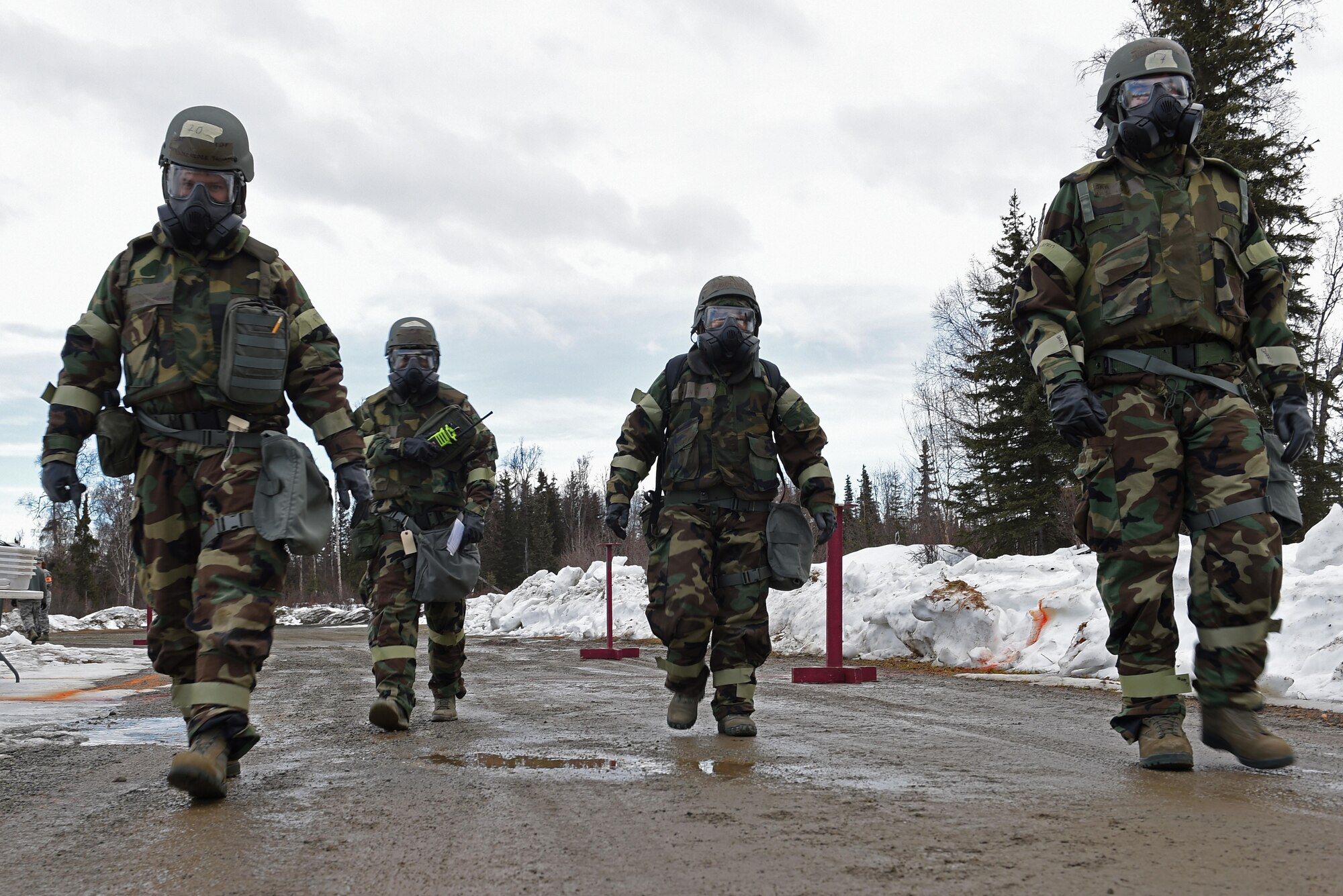 Airmen participate in Exercise Polar Force 17-4 at Joint Base Elmendorf-Richardson, Alaska, April 6, 2017. During the routine training exercise, Airmen donned Mission Oriented Protective Posture gear and engaged in various scenarios which tested their ability to handle real-world situations. 