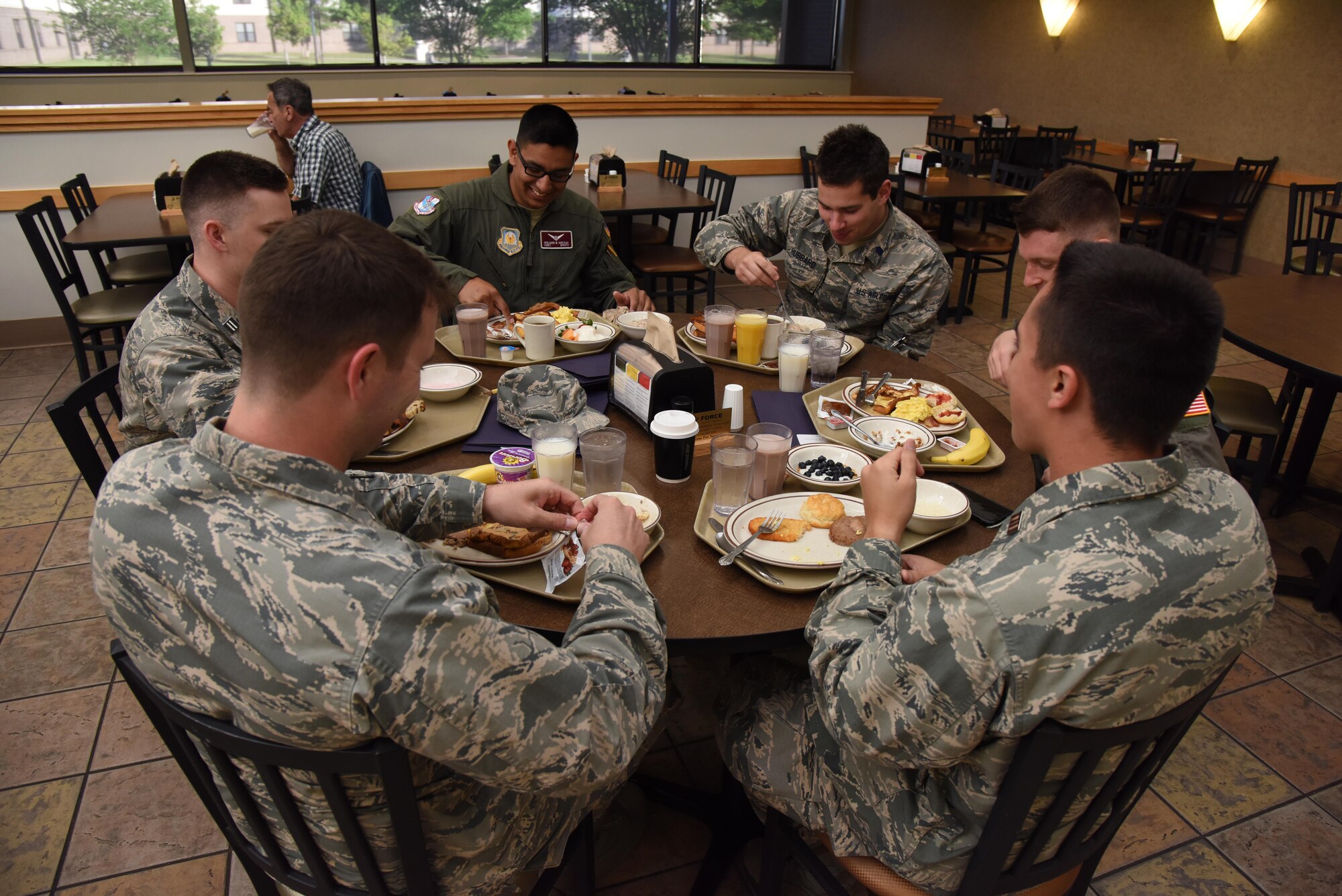Air Force ROTC cadets eat breakfast in the Azalea Dining Facility during Pathways to Blue April 7, 2017, on Keesler Air Force Base, Miss. Pathways to Blue, an annual event hosted by 2nd Air Force with the support of the 81st Training Wing and the 403rd Wing, allowed cadets to receive hands-on briefings with technical and flying operations and an orientation flight in support of the Air Force's Diversity Strategic Roadmap program. (U.S. Air Force photo by Kemberly Groue)