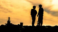 U.S. Army Reserve Soldiers with range operations discuss night fire qualification set up while the sun sets during Operation Cold Steel at Fort McCoy, Wis., April 2, 2017. Operation Cold Steel is the U.S. Army Reserve's crew-served weapons qualification and validation exercise to ensure that America's Army Reserve units and Soldiers are trained and ready to deploy on short-notice and bring combat-ready and lethal firepower in support of the Army and our joint partners anywhere in the world. (U.S. Army Reserve photo by Spc. Maurice Cheeks, 319th Medical Detachment)