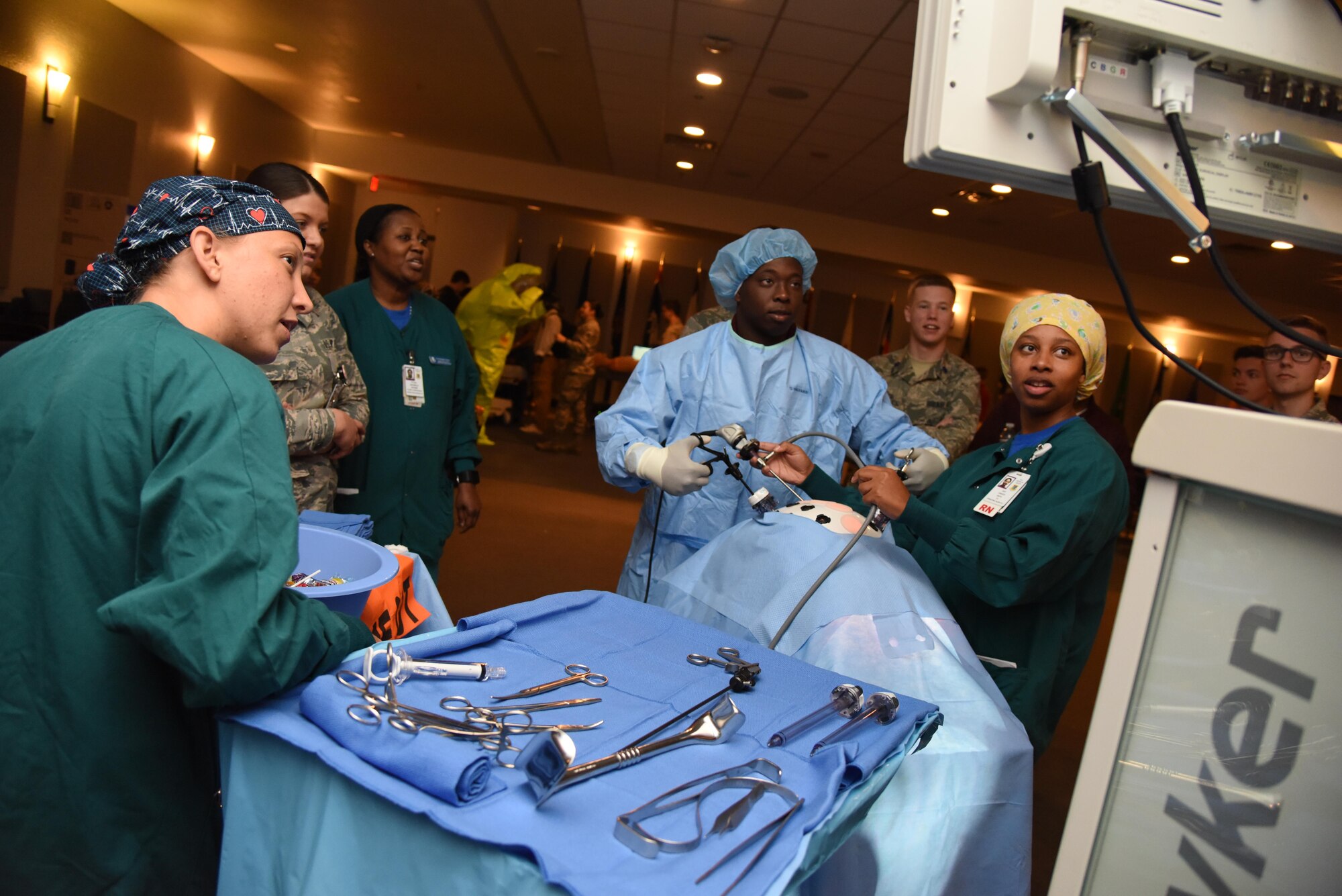 Cadet Laugston Thompson, Mississippi State University Air Force ROTC cadet, simulates a laparoscopic procedure in the Keesler Medical Center Don Wylie Auditorium during Pathways to Blue April 7, 2017, on Keesler Air Force Base, Miss. Pathways to Blue, a diversity and inclusion outreach event hosted by 2nd Air Force with the support of the 81st Training Wing and the 403rd Wing, provided 178 cadets who traveled here from seven detachments a chance to interact with officers from 36 different specialties from across the Air Force. (U.S. Air Force photo by Kemberly Groue)

