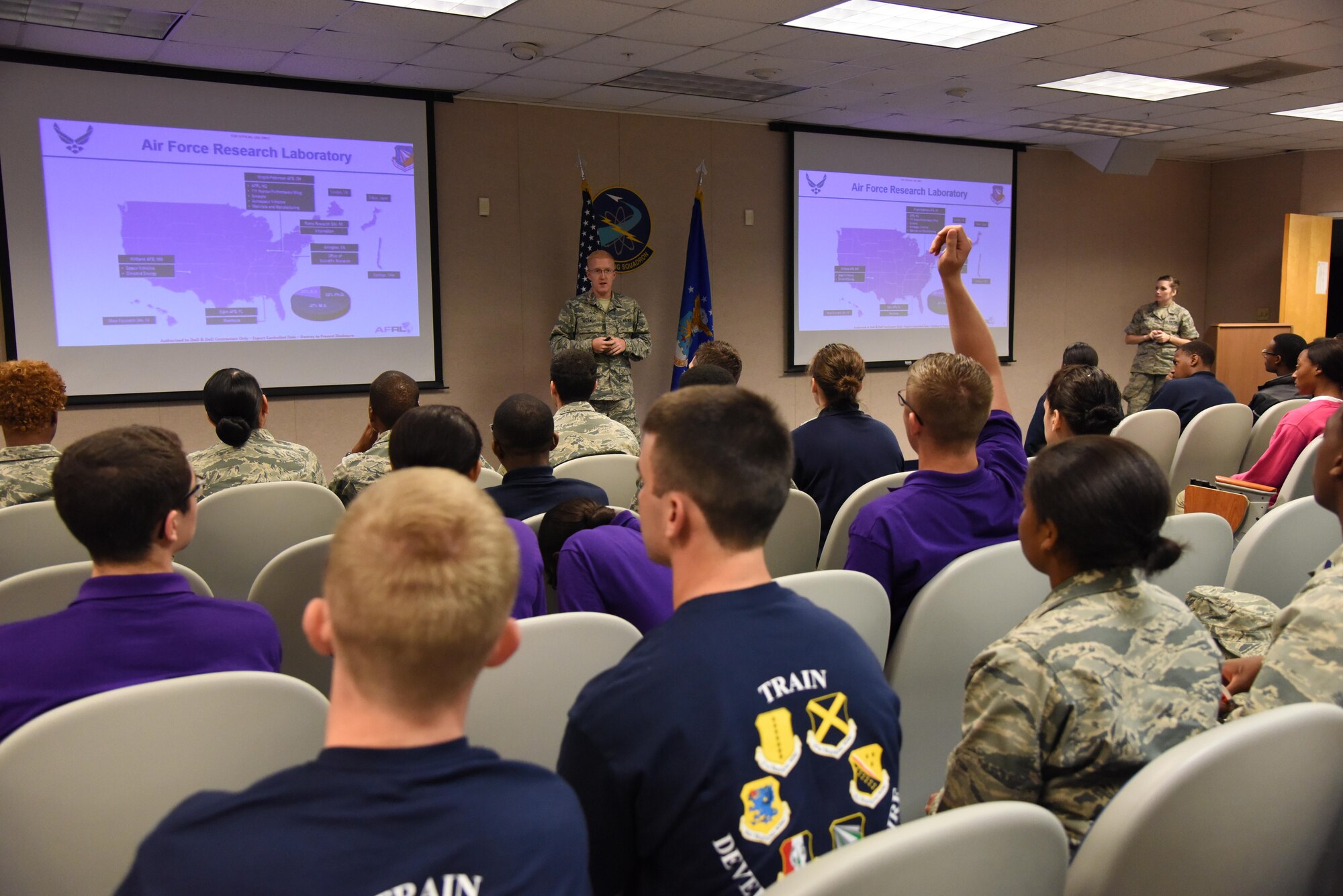 Second Lt. Dylan Slizewski, Air Force Research Laboratory explosive research chemist, Eglin Air Force Base, Fla., briefs Air Force ROTC cadets on  on one of many an AFRL career field in McClelland Hall during Pathways to Blue April 8, 2017, on Keesler Air Force Base, Miss. Pathways to Blue is a diversity outreach event hosted by 2nd Air Force with the support of the 81st Training Wing and the 403rd Wing. The event provided the 178 cadets who traveled here from seven detachments a chance to interact with officers from 36 different specialties from across the Air Force. (U.S. Air Force photo by Kemberly Groue)
