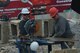 Ed Muller, left, and Chuck Pickard, right, contractors, cut a metal beam while repairing an aircraft fire trainer at Shaw Air Force Base, S.C., April 6, 2017. The contractors are renovating existing training structures on the 20th Civil Engineer Squadron fire emergency services training grounds, as well as adding an additional structure that will provide more opportunities for the firefighters to train skills such as roof ventilation. (U.S. Air Force photo by Airman 1st Class Destinee Sweeney)