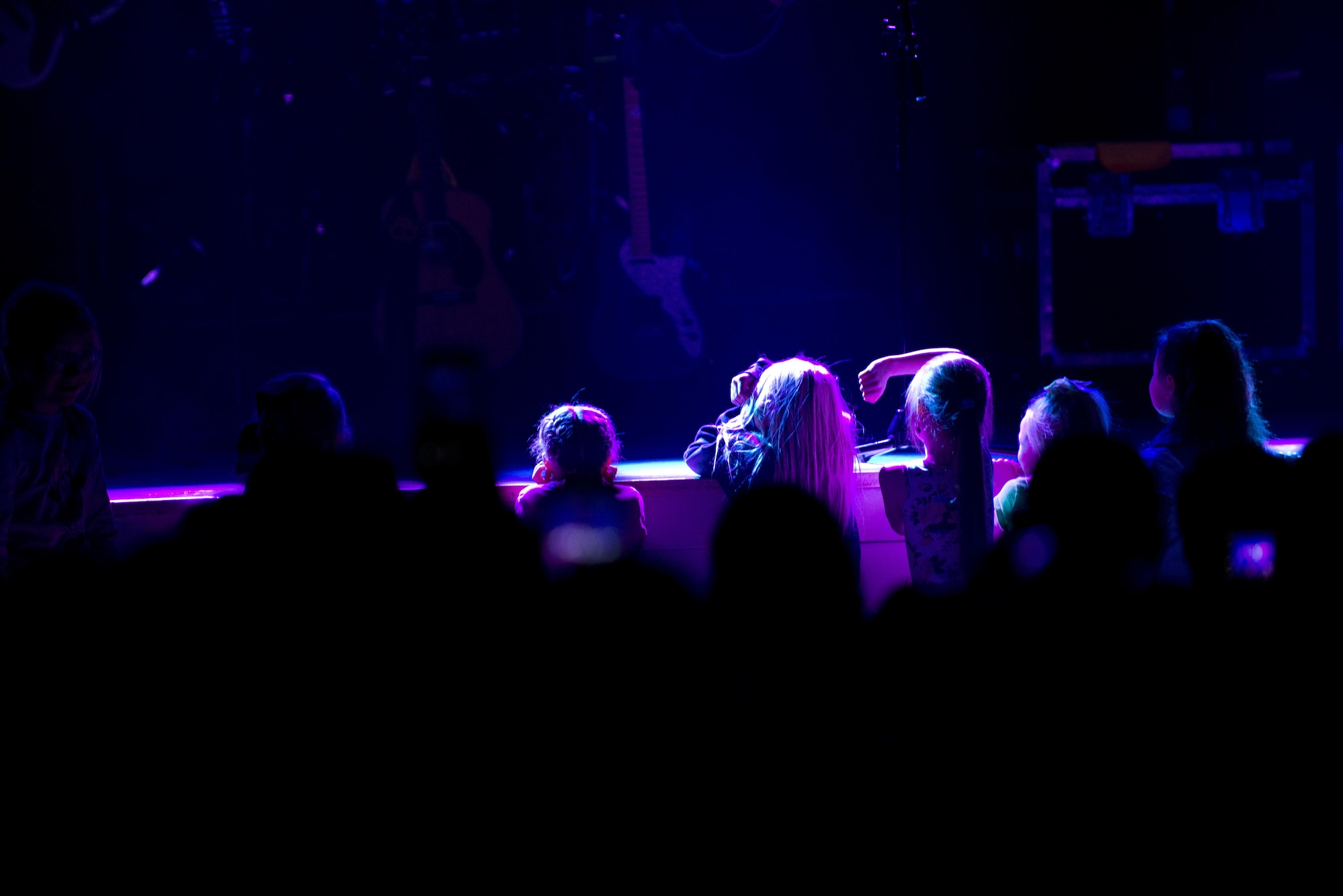 Cassadee Pope, an American singer and songwriter performs at the Frontier Theater on Joint Base Elmendorf-Richardson, Alaska, April 9, 2017. Pope rapidly rose to celebrity status after co-writing a song with Blake Shelton and winning first place in a vocal talent television show.