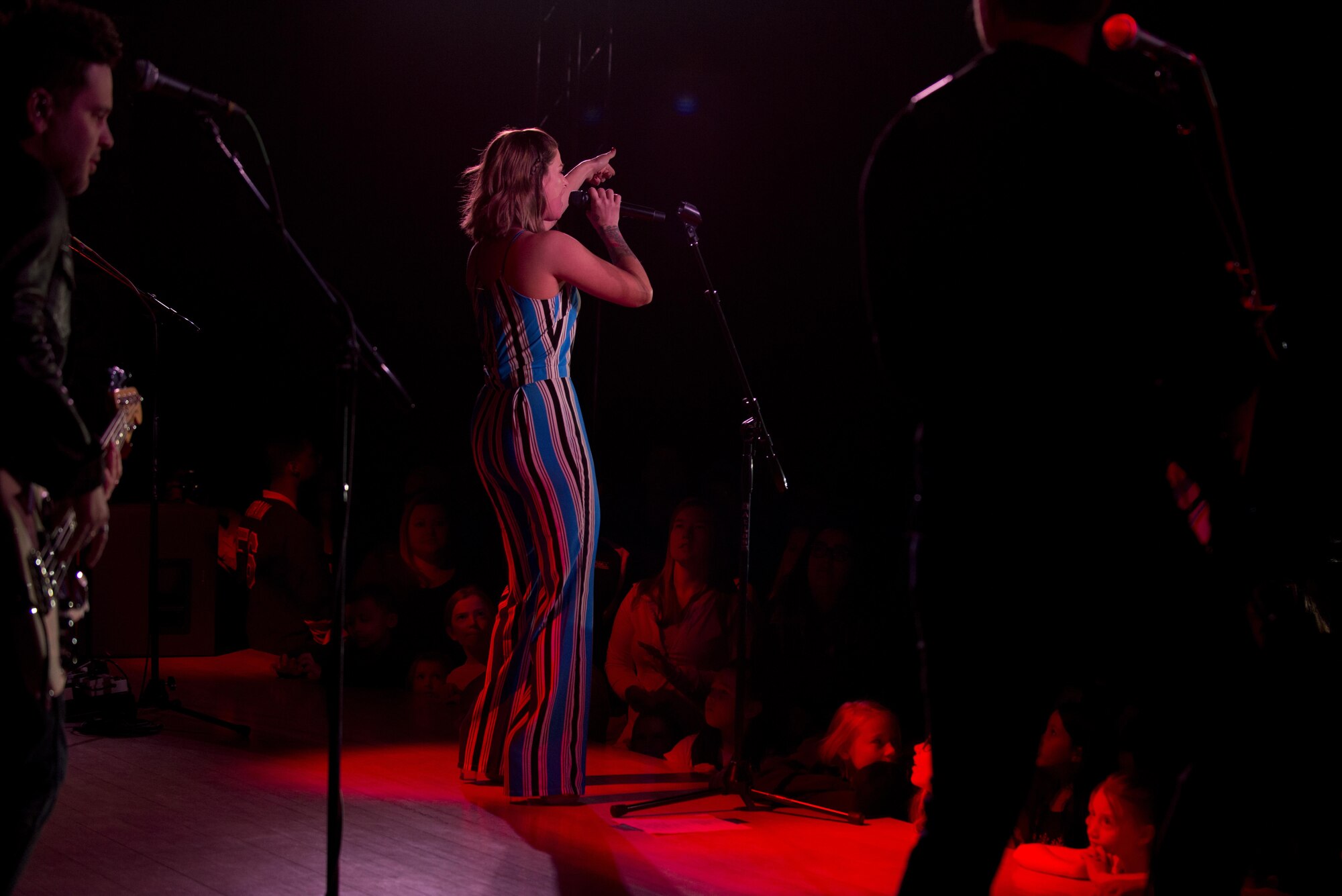 Cassadee Pope, an American singer and songwriter performs at the Frontier Theater on Joint Base Elmendorf-Richardson, Alaska, April 9, 2017. Pope rapidly rose to celebrity status after co-writing a song with Blake Shelton and winning first place in a vocal talent television show.