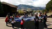 Attendees participate in a parachute activity during the Tragedy Assistance Program for Survivors Good Grief Camp at Cheyenne Mountain Resort, Colorado, Sunday, April 2, 2017. The activity provided play therapy for the 3-to-6 year-olds. (Courtesy photo)