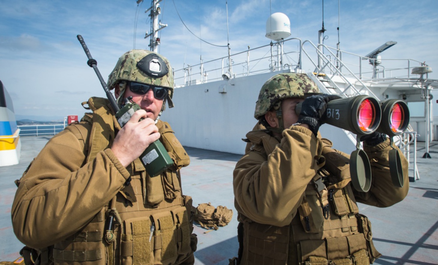 Chief Master-at-Arms Jason Wage and Master-at-Arms 2nd Class Emilio Donatlan, both assigned to Coastal Riverine Group 1, report an incoming vessel to the U.S. Coast Guard's Port Security Unit 312 during a small-boat training scenario off the coast of Pohang during Operation Pacific Reach Exercise 2017 (OPRex17), April 10, 2017. OPRex17 is a bilateral training event designed to ensure readiness and sustain the ROK-U.S. alliance by exercising an area distribution center, an air terminal supply point, combined joint logistics over-the-shore, the use of rail, inland waterways, and the coastal lift operations to validate the operational reach concept.