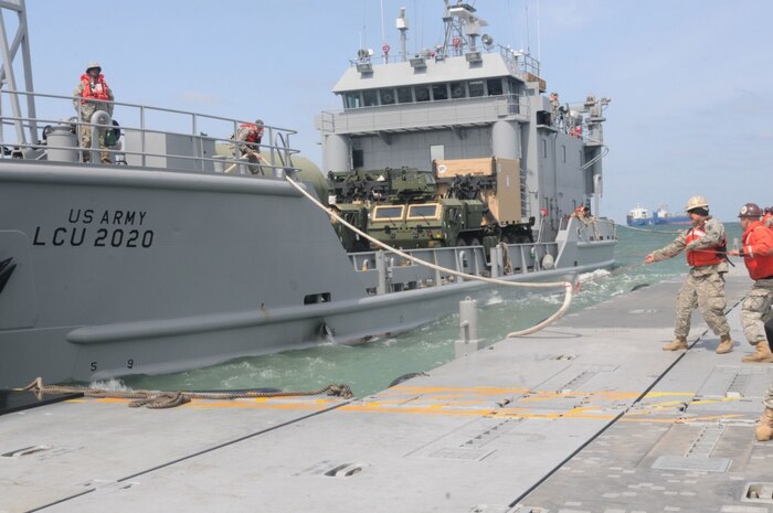 Soldiers attached to 331st Transportation Company moor lines onto the Trident Pier rail to support and position the Landing Craft Utility 2020 ship during Operation Pacific Reach 2017 at Pohang Republic of Korea, April 10. Service members from the Army, Navy and Marines came together to participate in the combined joint exercise that tested Logistics Over-the-Shore, inland waterway and Air Terminal Supply Point capabilities. 