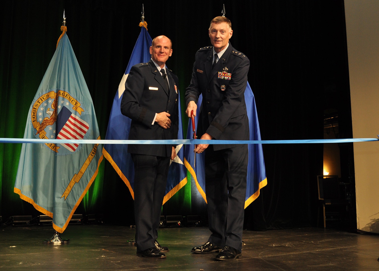 DLA Director Air Force Lt. Gen. Andy Busch joined DLA Energy Commander Air Force Brig. Gen. Martin Chapin for the Worldwide Energy Conference trade show ribbon-cutting ceremony at the Gaylord National Hotel & Convention Center Apr. 10.