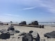 Tractors and pipe are pre-positioned at Oceanside Beach in preparation for the Oceanside Harbor navigation dredging project. The pipe will transport beach quality sand from the harbor entrance channel to renourish the beach south of the San Luis Rey River.